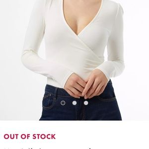 Ivory wrap front jersey body suit